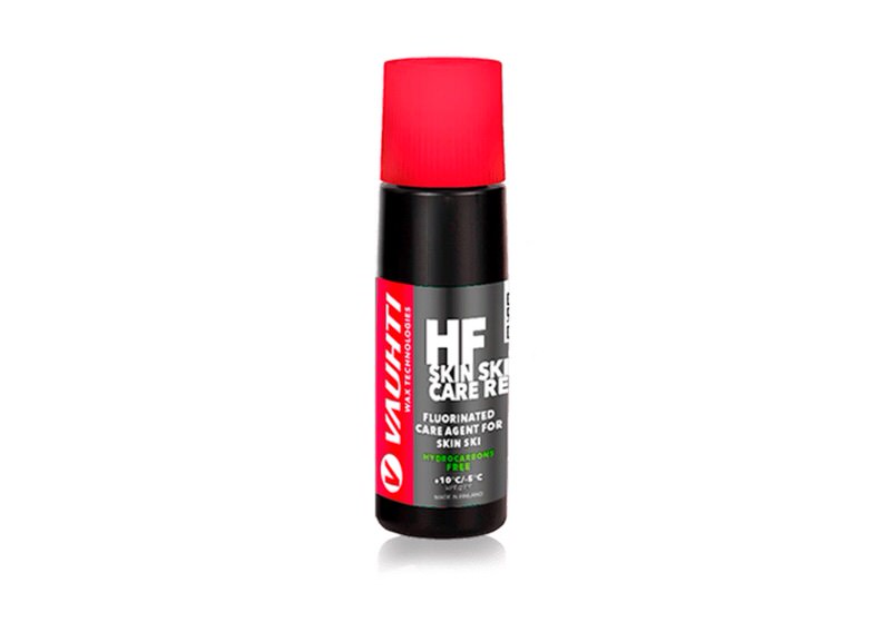 Schwarze Flasche Vauhti Skin Care Red für Ski mit rotem Schwammkopf.