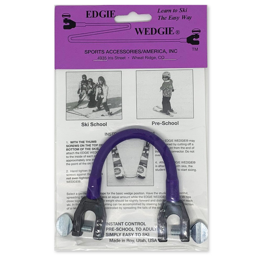 Verpackter, violetter Edgie Wedgie Original. Ein Hilfsmittel zum Skifahren lernen für Kinder. Gummiband mit Klemmen.