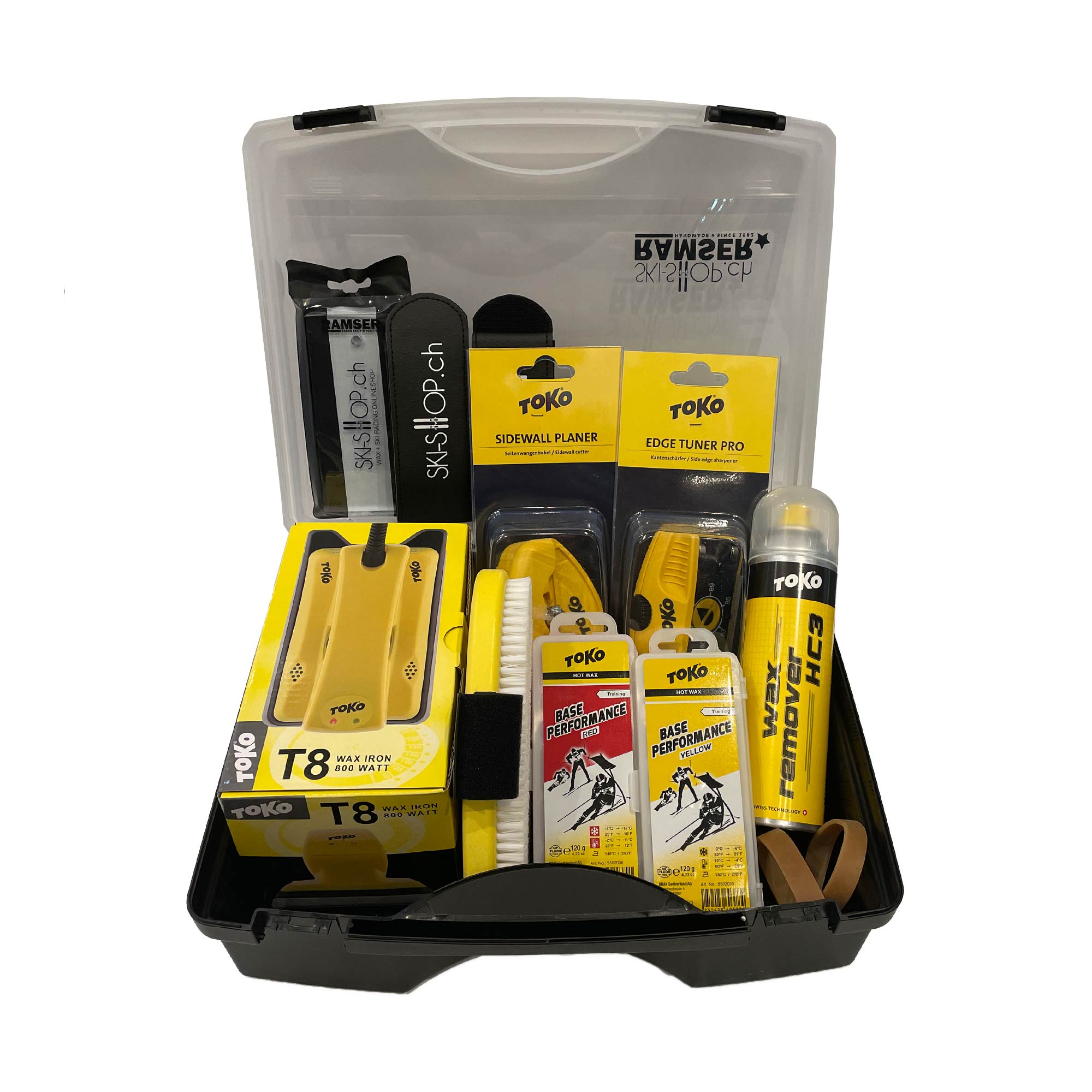 Toko Wax Box Plus Set mit Wachseisen, Kantenbearbeitungswerkzeugen und Zubehör in einer schwarzen Aufbewahrungsbox.