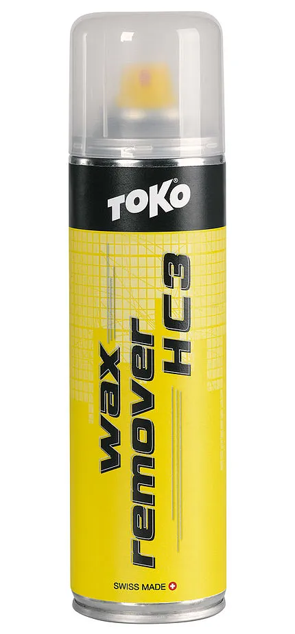 Gelbe Sprühdose Toko Wax Remover HC3 für Snowboard, mit transparentem Deckel. Schwarze Schrift auf gelbem Hintergrund.