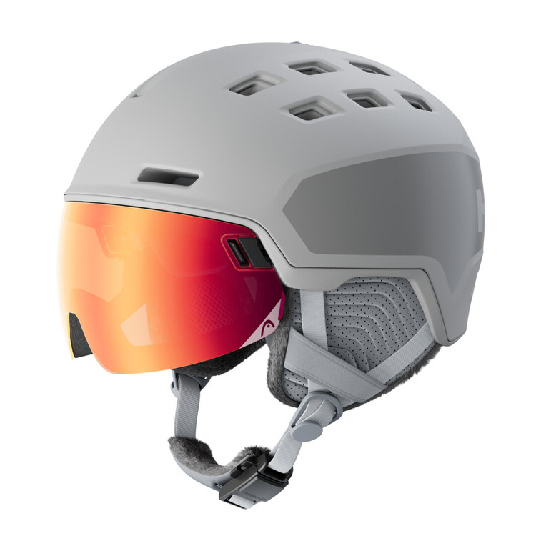 Grauer Skihelm "Head Rachel Pro" mit rotem Visier und Belüftungslöchern, Nahaufnahme.