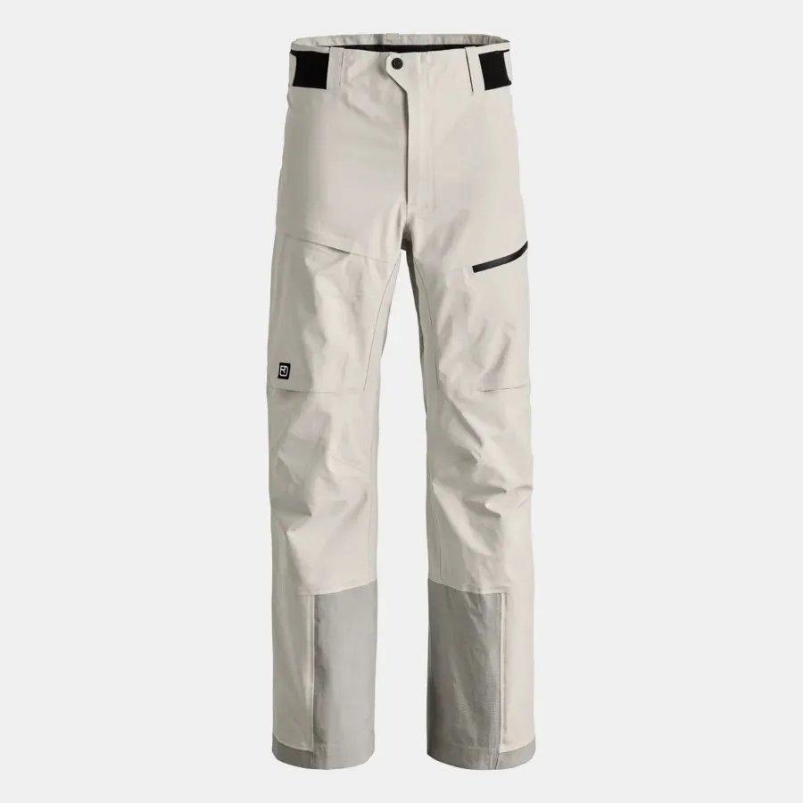 Light-colored trousers with black waistband, zipped pocket, logo on the leg and reinforced grey leg ends.