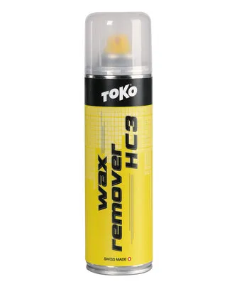 Gelbe Dose Toko HC3 Wachsentferner mit durchsichtigem Deckel und schwarzer Aufschrift.