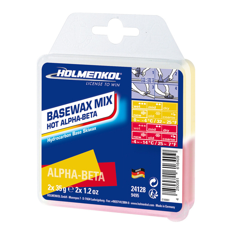 Verpackung von Holmenkol Worldcup Mix Hot Wachs in Gelb und Rot, mit Temperatur- und Schneeart-Anleitungen.