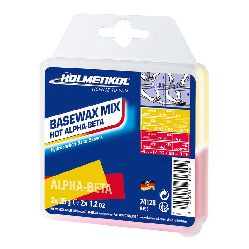 Verpackung von Holmenkol Worldcup Mix Hot Wachs in Gelb und Rot, mit Temperatur- und Schneeart-Anleitungen.