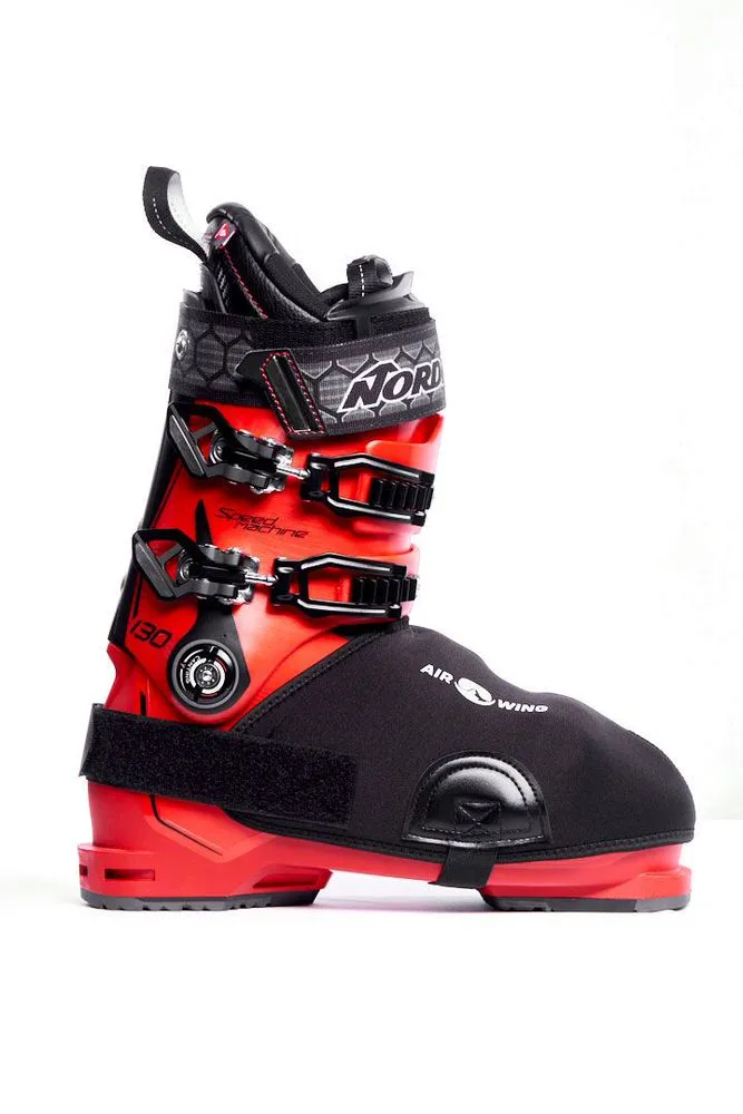 Red ski boot with black Airwing bootcover, side view on white background.