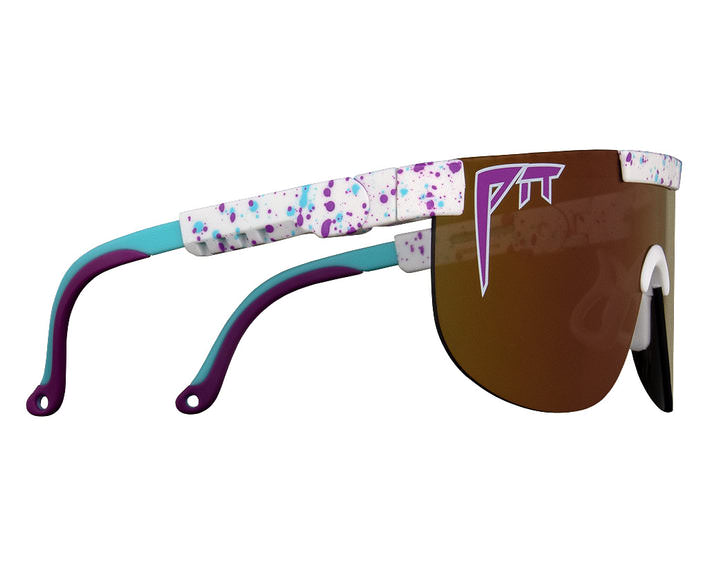 Elliptische Sonnenbrille Jetski Lila-türkise Jetski Elliptical Sonnenbrille mit braun getönten Gläsern und weiß gesprenkeltem Rahmen, Seitenansicht.