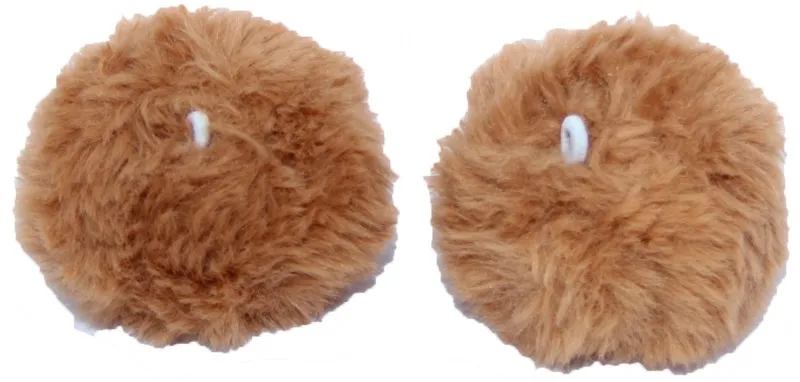 Two fluffy, round pom-poms in warm brown. Each soft pom-pom has a small white loop for easy attachment to children's winter accessories such as hats or balaclavas. Playful, decorative accessories.