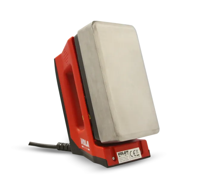 Red Digital Iron Pro waxing iron with silver heating plate and black cable.