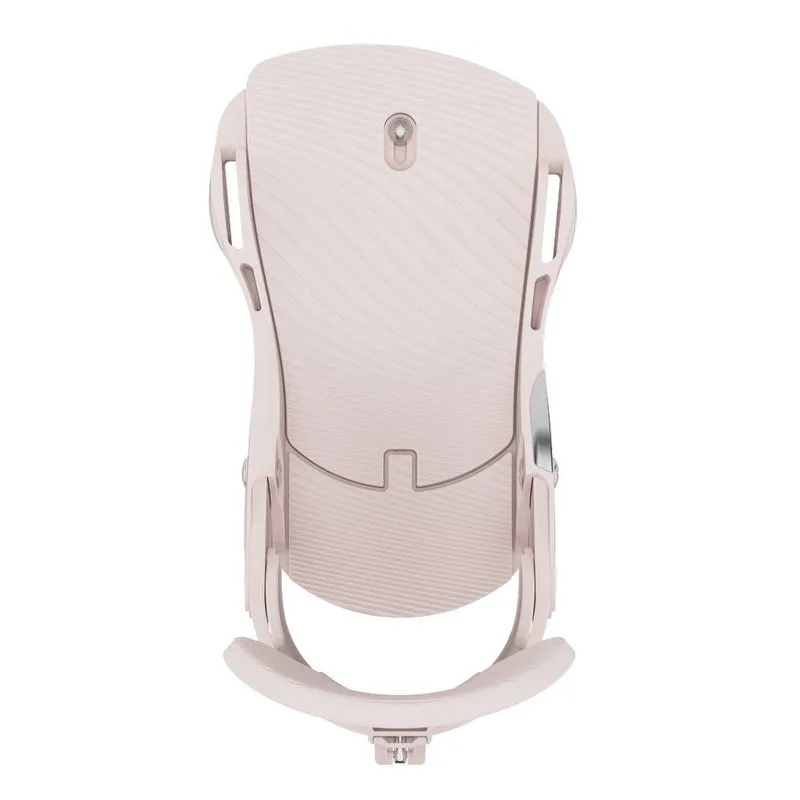 Close-up of the Union Trilogy snowboard binding in soft pink, photographed from above.