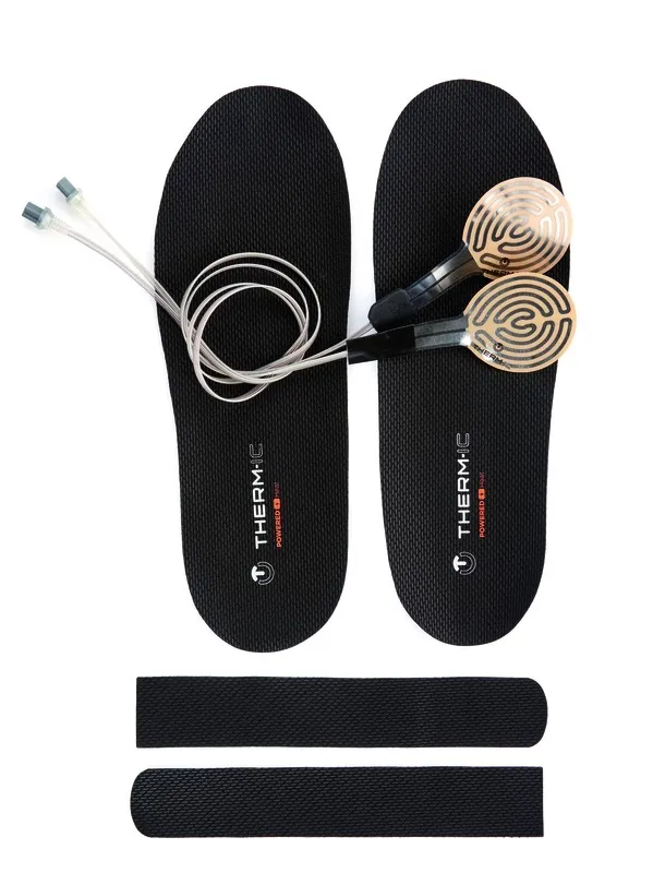 Therm-ic Insole Heat Kit: Two insoles with heating elements and accessories for fitting.