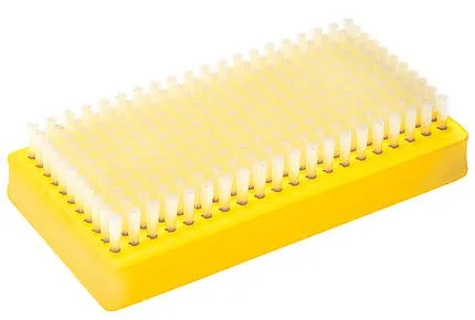 Yellow polishing brush with transparent, soft bristles for skis.