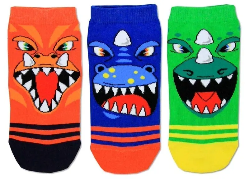 Trois chaussettes colorées de la collection United Oddsocks LKROAR avec des visages de monstres imprimés.