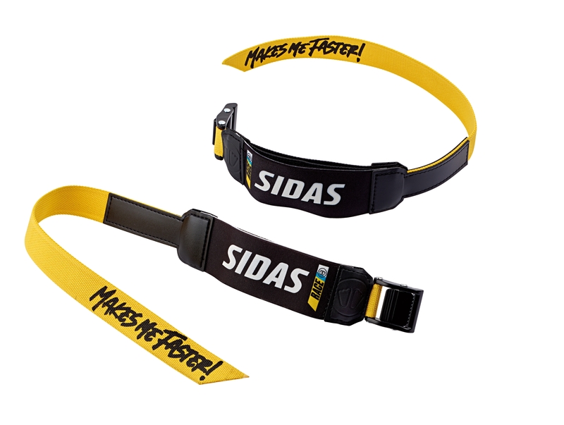 Zwei Sidas Power Straps mit gelben Bändern, schwarzen Applikationen und "Makes me faster!" Schriftzug.