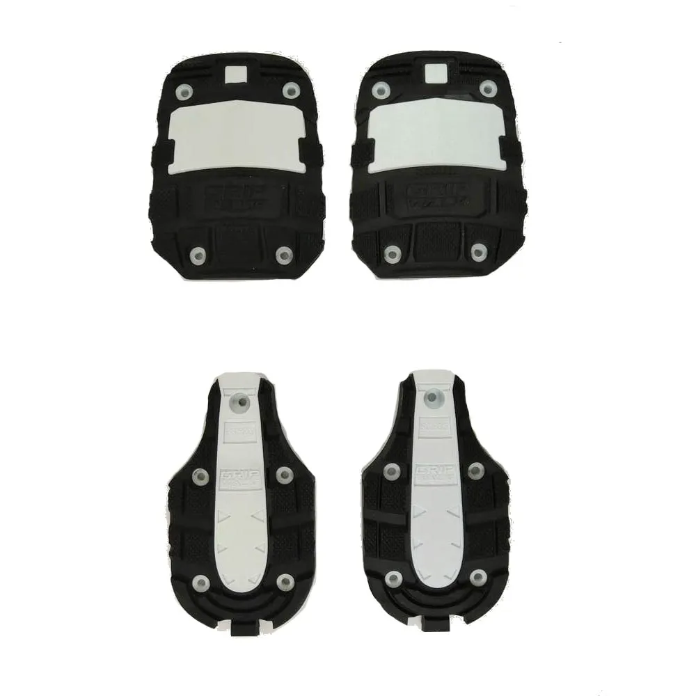 Four black HEAD GripWalk Kit GW KORE soles, two for the heel and two for the toe, on a white background.