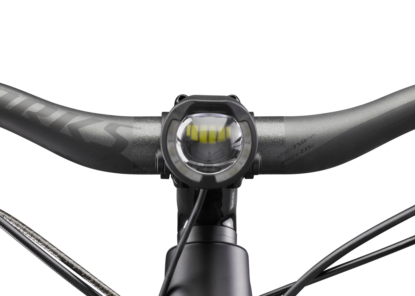 Nahaufnahme: E-Bike Lenker mit montierter Lupine SL S Yamaha Beleuchtung. Scheinwerfer zentral.