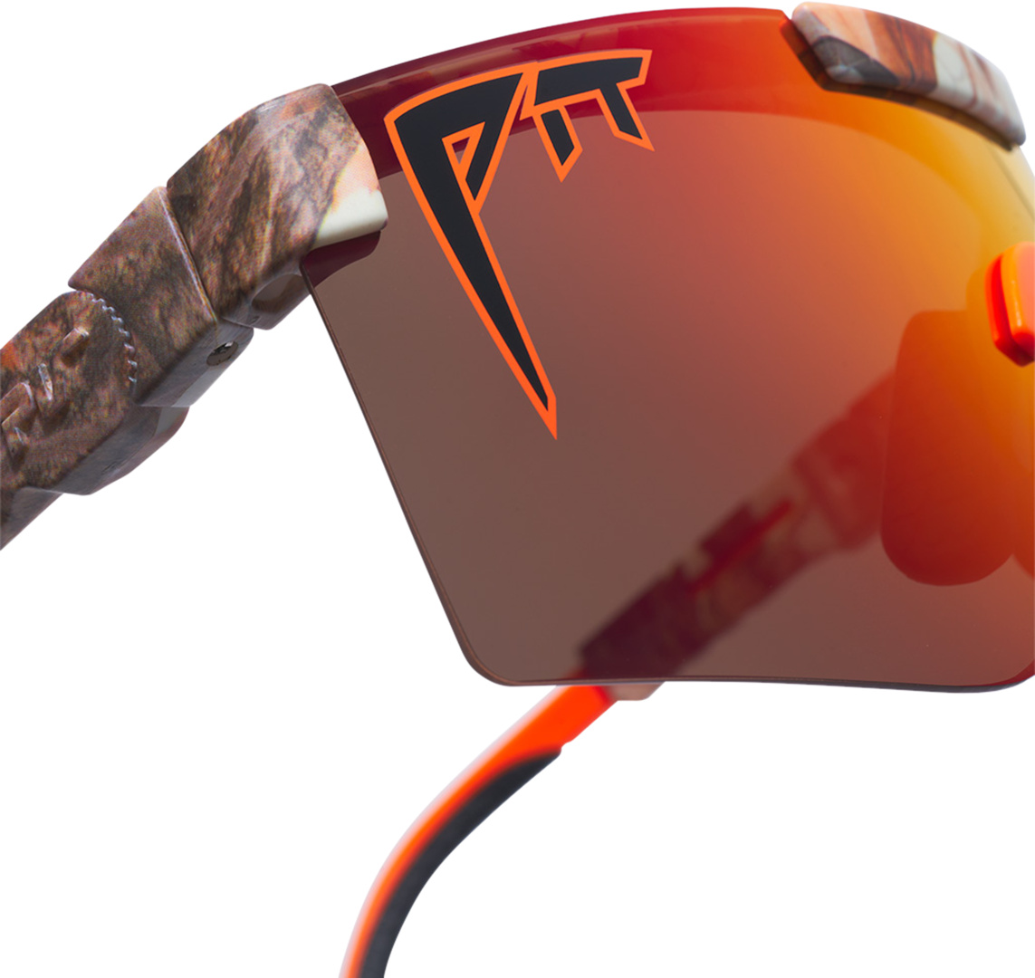 Pit Viper Lunettes de soleil Bush Gros plan : Pit Viper The Actual Bush Lunettes de soleil, verres polarisés rouges, motif camouflage, logo noir.