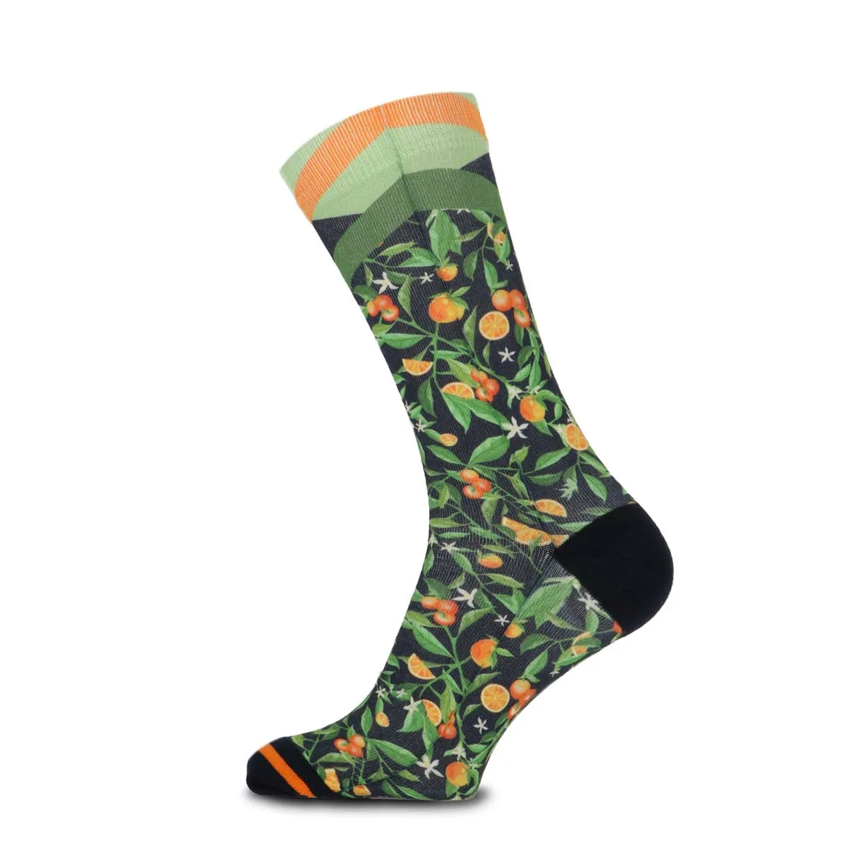 A sock with a dark background and citrus fruit pattern, with orange and green stripes at the top.