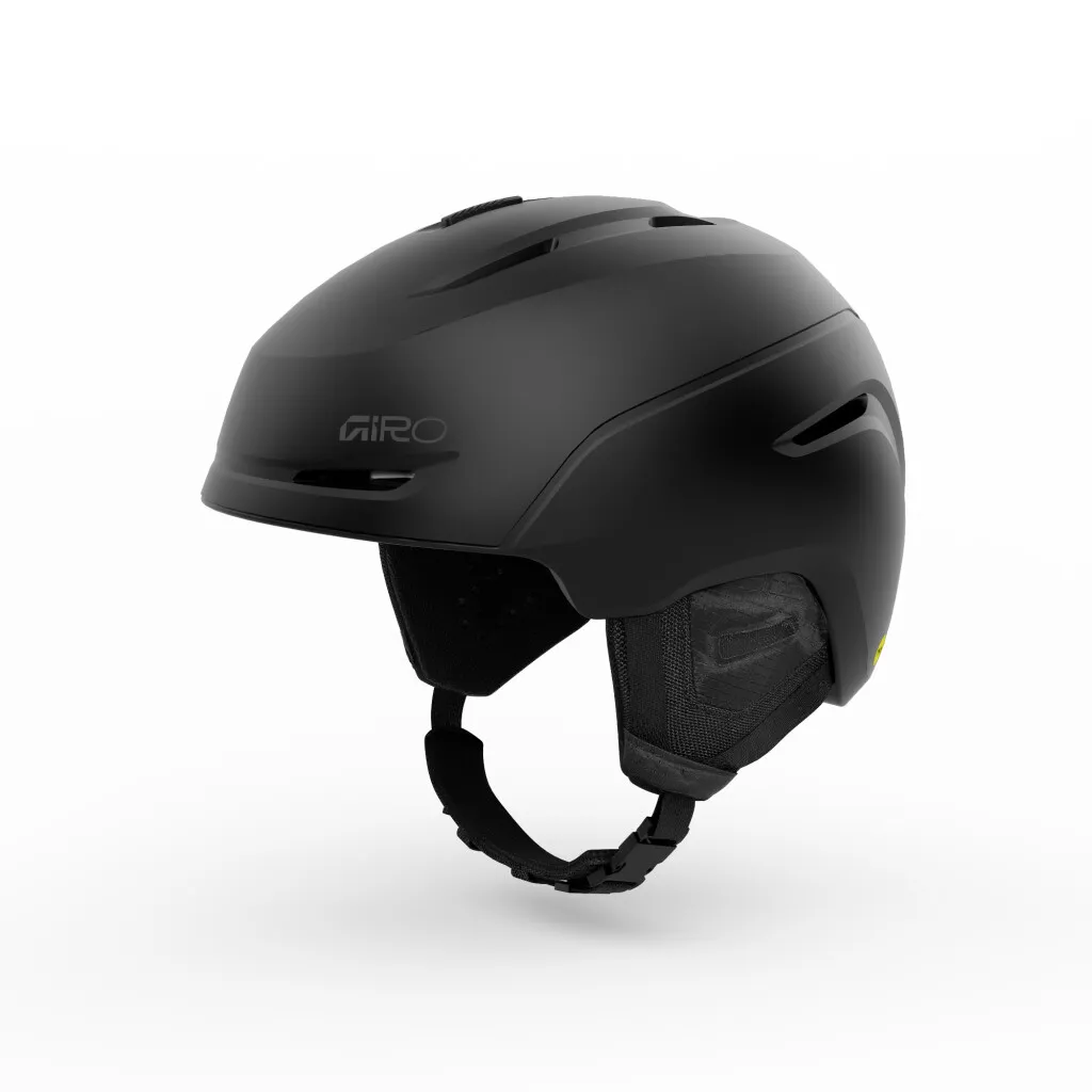 Black ski helmet from the brand Giro with chin strap and ear pads, insulated against a white background.