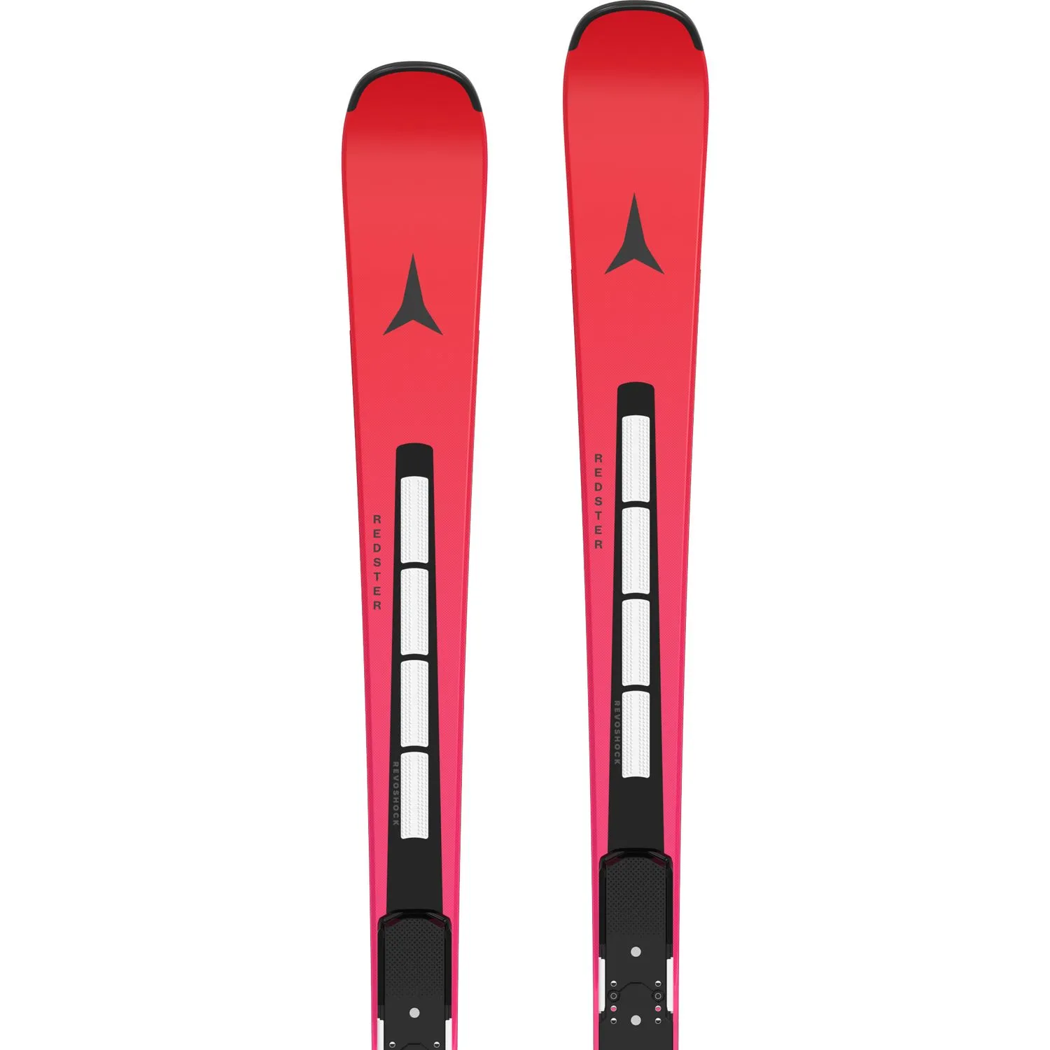 Two red Atomic skis are standing upright next to each other, with black lettering and symbols. The bindings are visible.