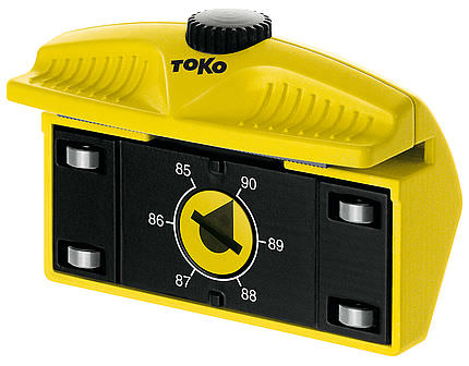 Gelber Toko Edge Tuner Pro mit Einstellrad für Kantenwinkel und Rollenführung.