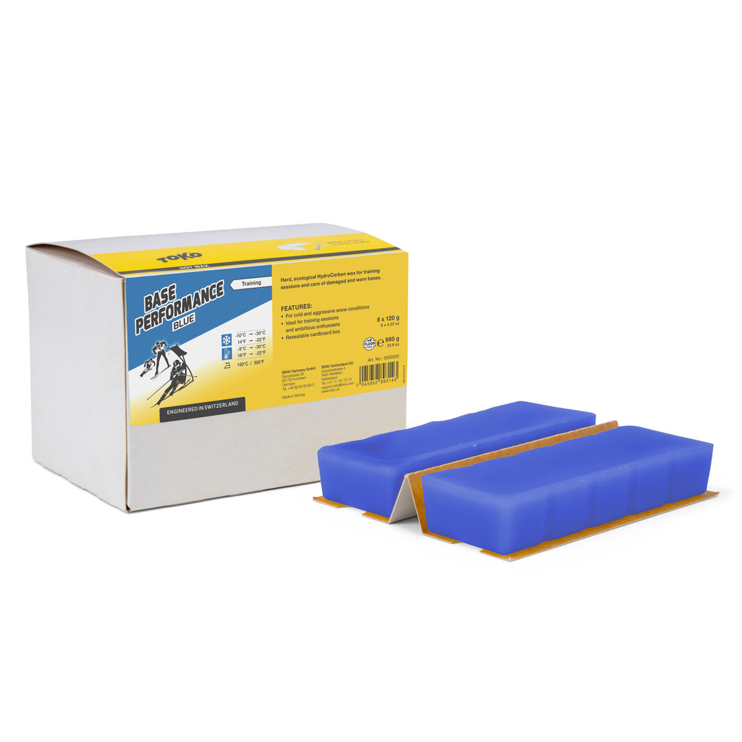 Toko Base Performance Blue Wachs, 960g Packung mit zwei blauen Wachsblöcken neben dem Karton.