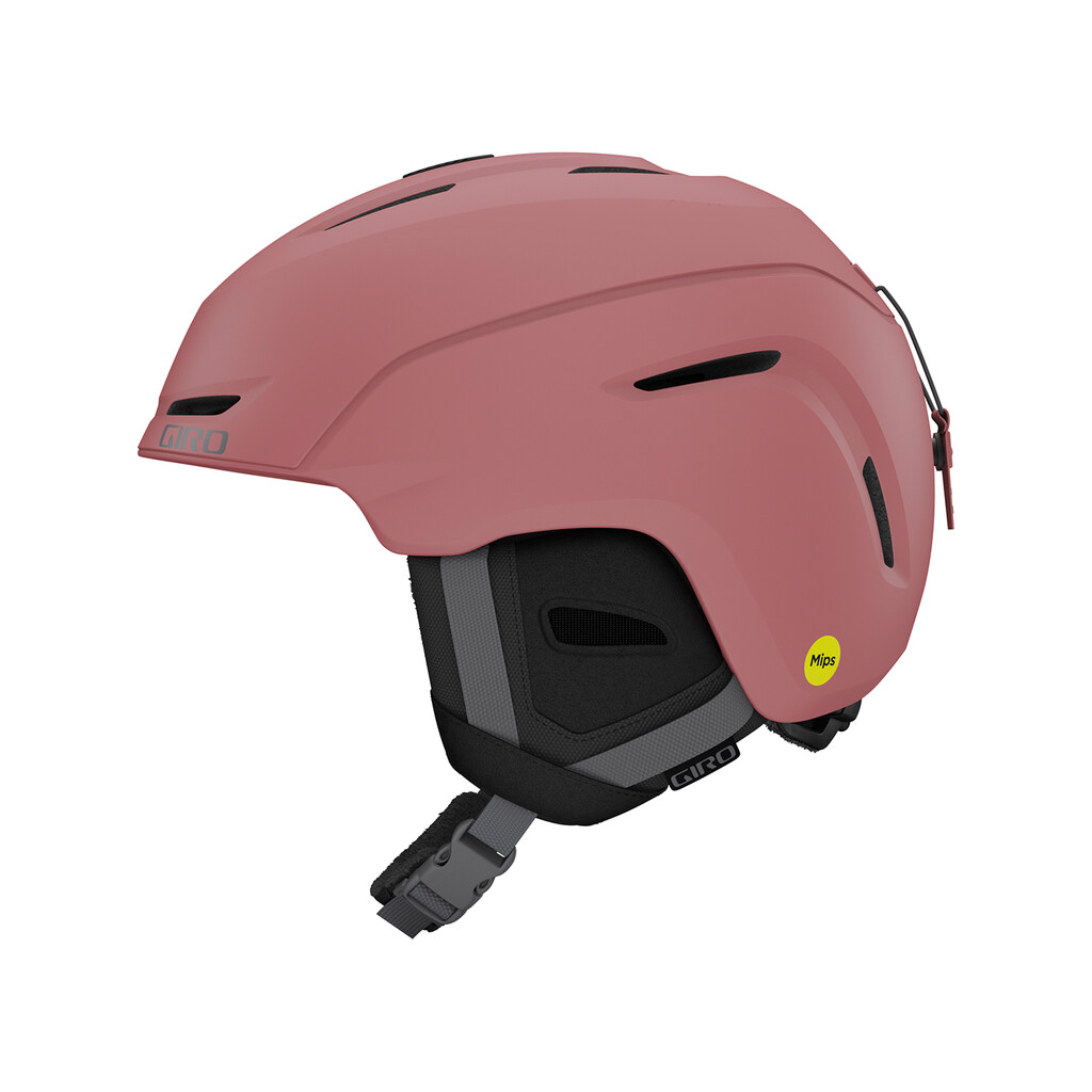 Casque de ski rose MIPS Casque de ski rose mat avec MIPS, inscription latérale Giro, trous d'aération et coussinets gris et noirs.
