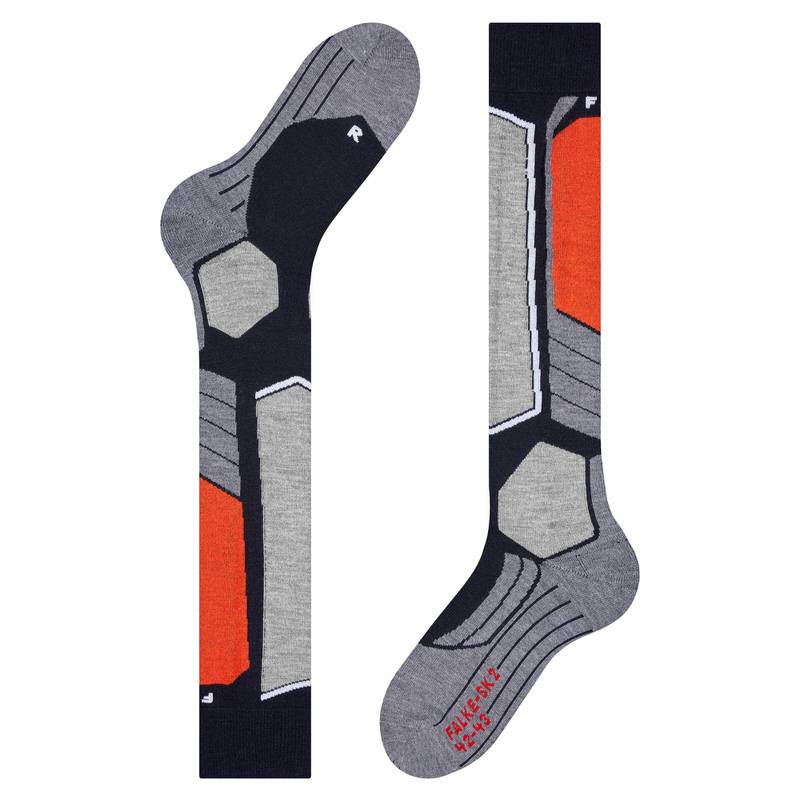 Deux Falke SK2 Mi-chaussettes de ski en marine, gris et orange avec un motif géométrique.