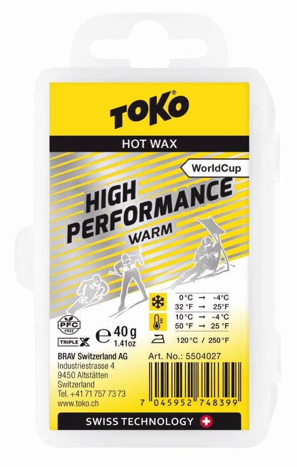 Verpackung Toko High Performance Warm Heisswachs, gelb-schwarz, mit Schnee-Piktogrammen und techn. Daten.