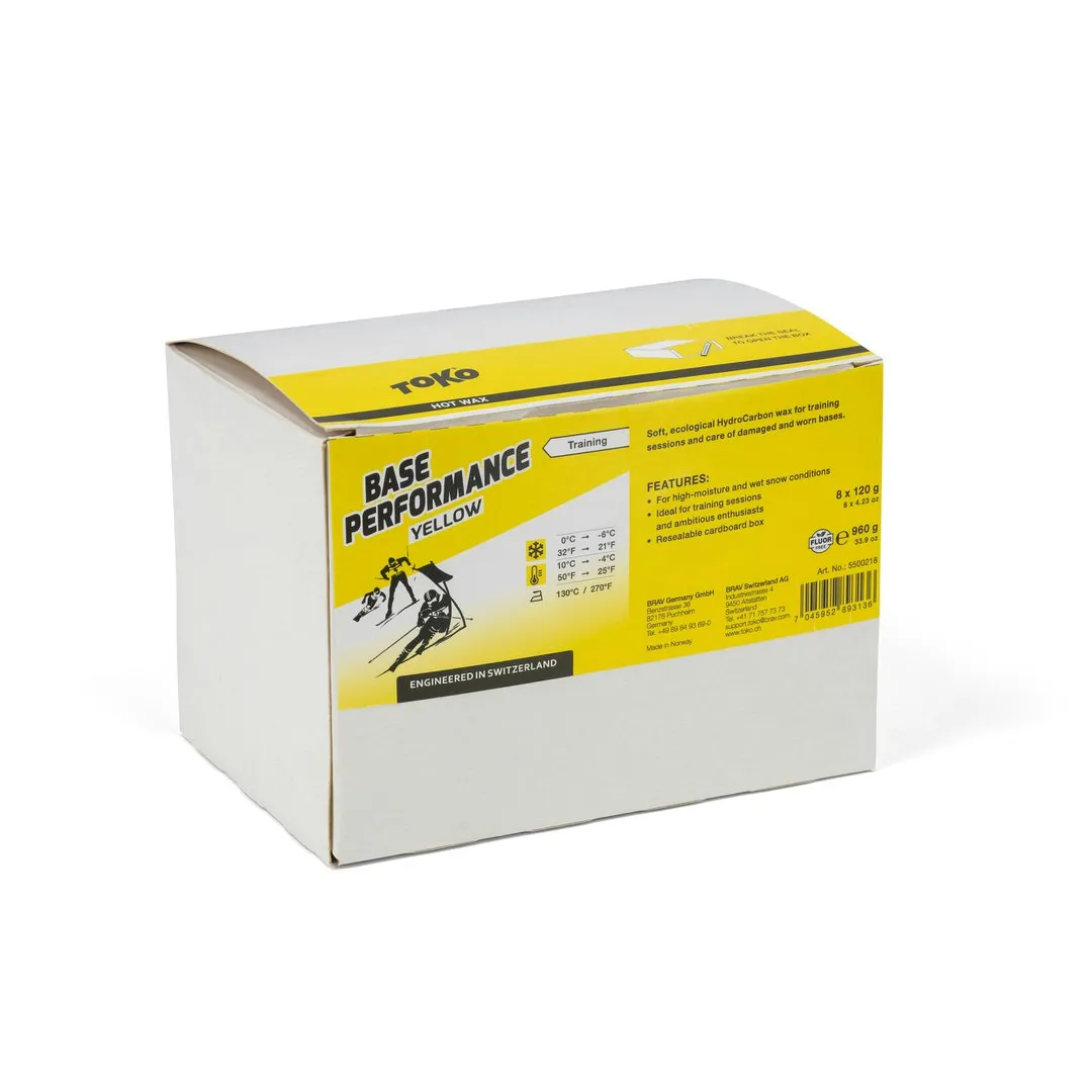 Verpackung Toko Base Performance Yellow Heisswachs mit Produktdetails und Piktogrammen.