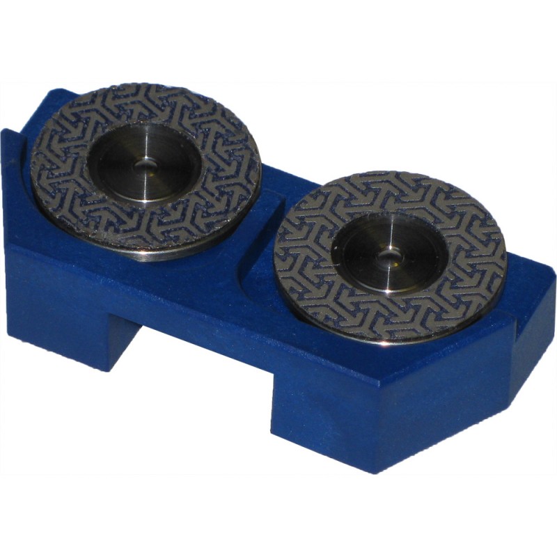 Nahaufnahme des Tooltonic Roto Finish RF800 mit zwei Schleifscheiben auf blauem Halter.