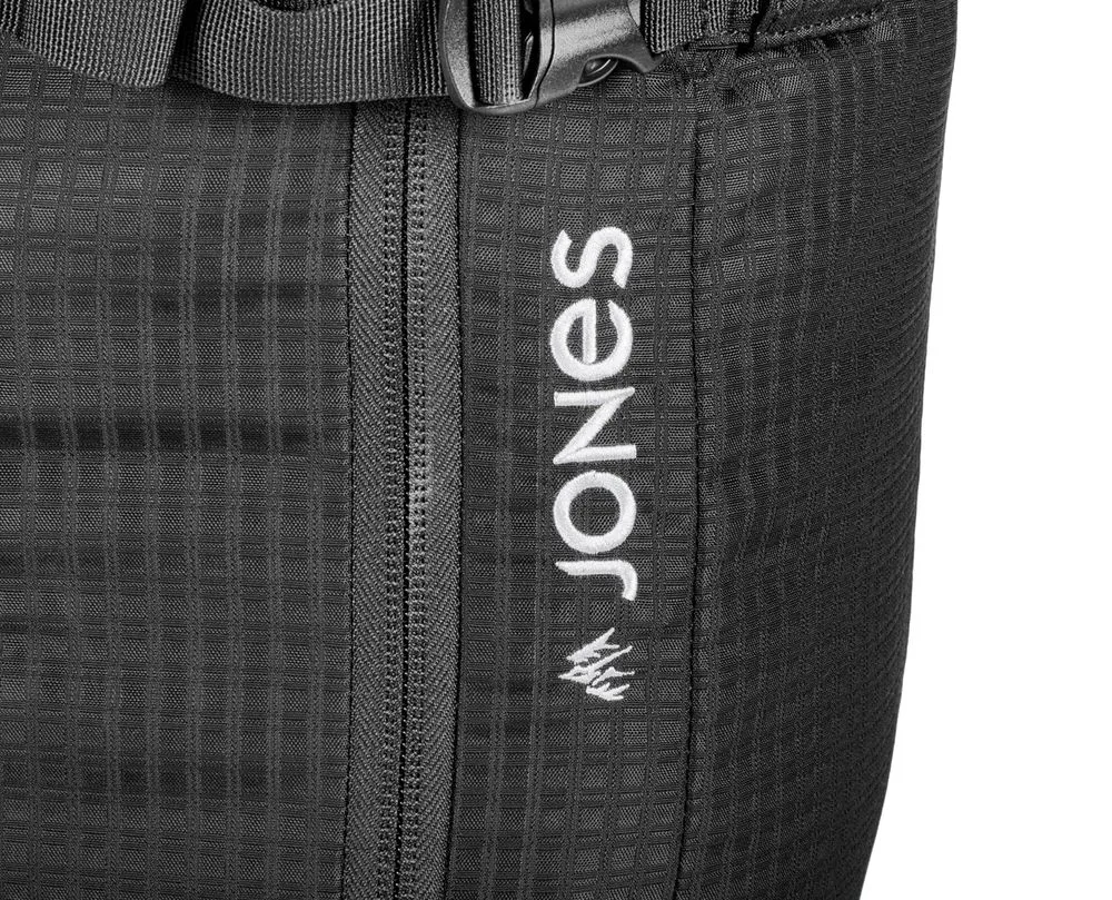Close-up of the black Jones DSCNT RAS backpack with zipper and logo.