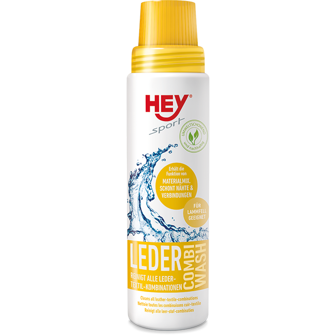Weiße Flasche Leder Combi Wash mit gelbem Verschluss und Aufdruck. Reinigt Leder-Textil-Kombinationen.