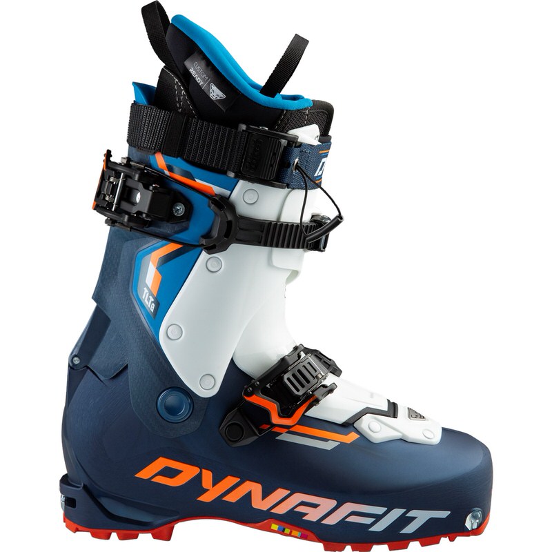 Ein Dynafit TLT8 Expedition CR Skitourenschuh in Blau-Weiß mit orangefarbenen Akzenten. Seitenansicht, Fokus auf Schaft und Schnallen.