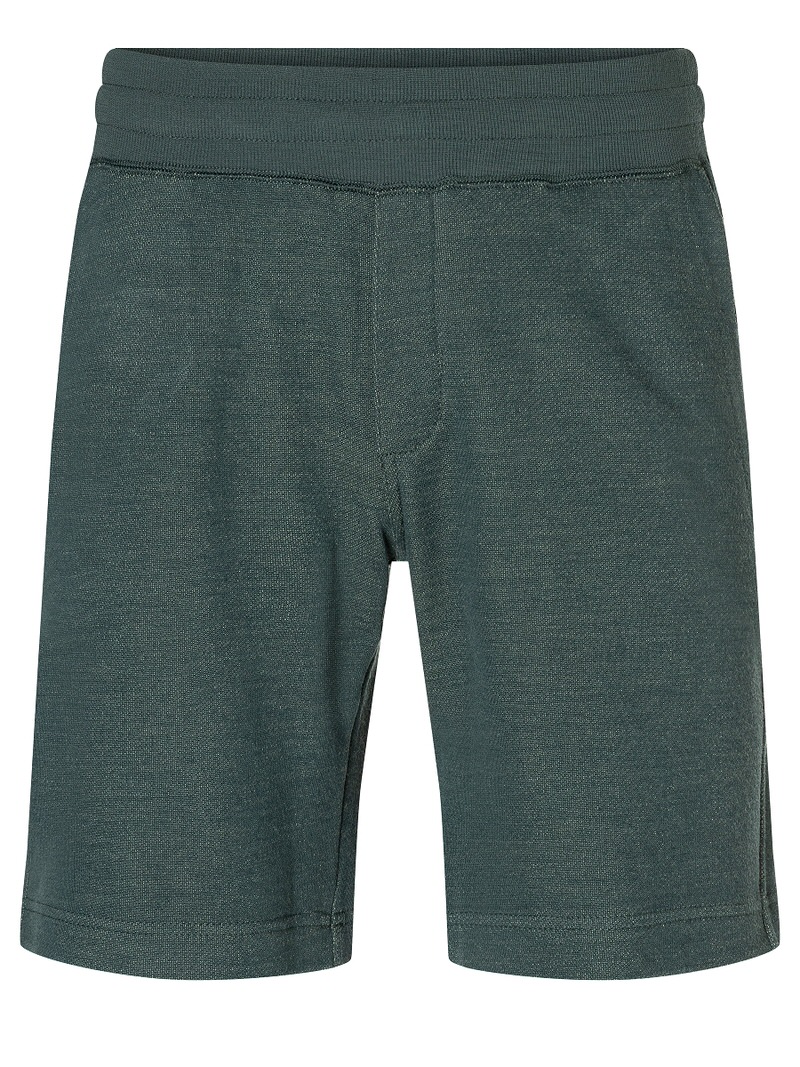 Nahaufnahme: Strickshorts in dunklem Grün mit elastischem Bund.