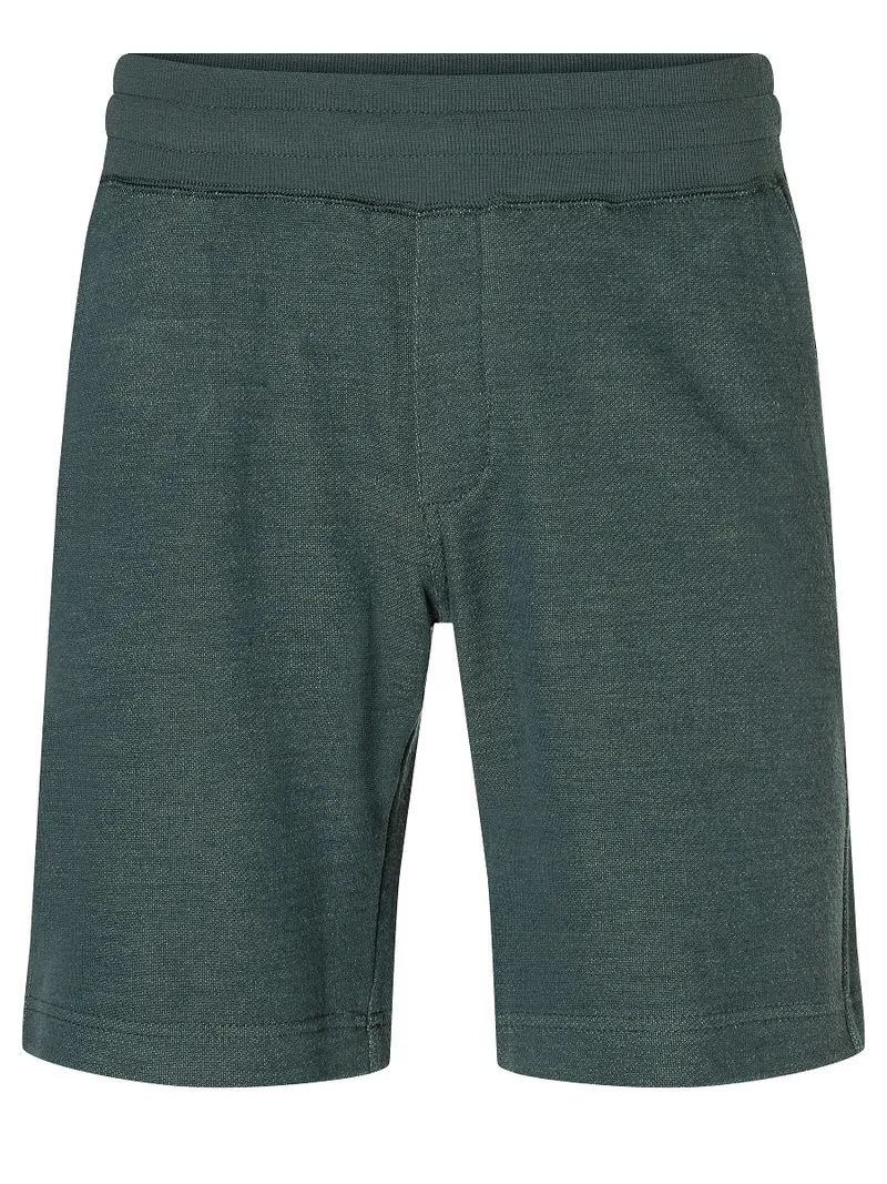 Nahaufnahme: Strickshorts in dunklem Grün mit elastischem Bund.
