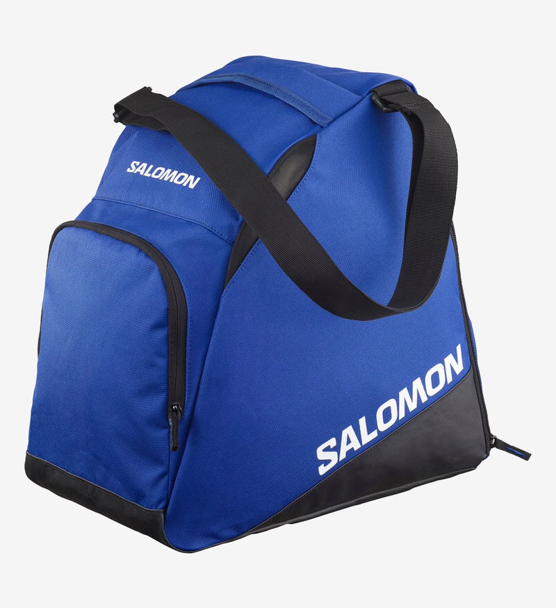 Blaue Salomon Skischuhtasche mit schwarzem Schultergurt und Reissverschluss.
