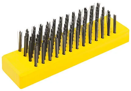 Yellow Toko Structure Brush with dense, metallic bristles in several rows.