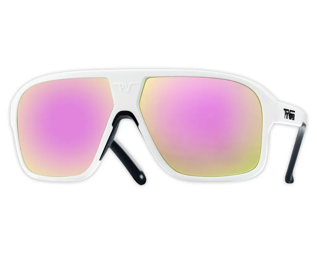 White Flight Optics sunglasses with a pink-yellow gradient on the lenses.