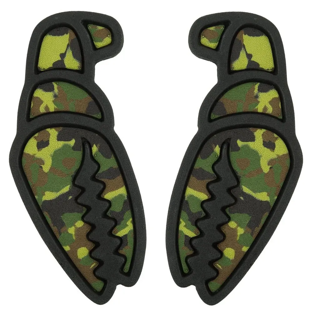 Two identical, crab-claw-shaped snowboard stomp pads in a camouflage pattern featuring shades of green, brown, and black. With a black border and a grippy, wavy surface for maximum grip. Mega Claw Camo Set.