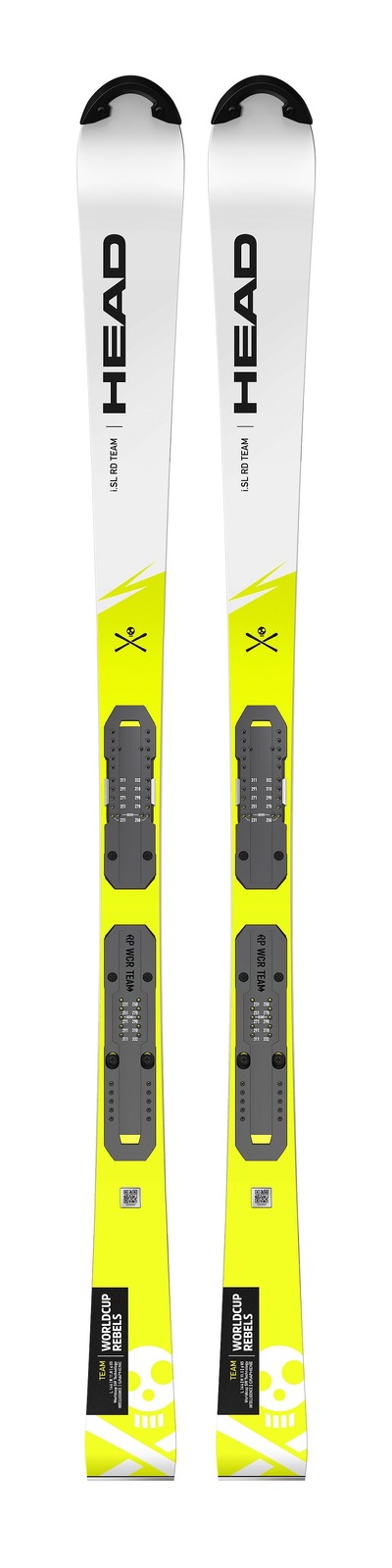 Two HEAD skis, white and yellow, with black bindings, stand upright next to each other in front of a white background.