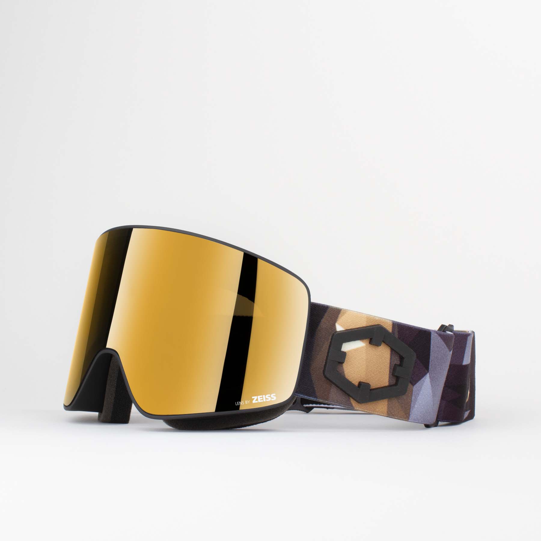 Goldene Skibrille Origami Goldene Out Of Void Origami Skibrille mit zylindrischer Zeiss Linse und gemustertem Kopfband.