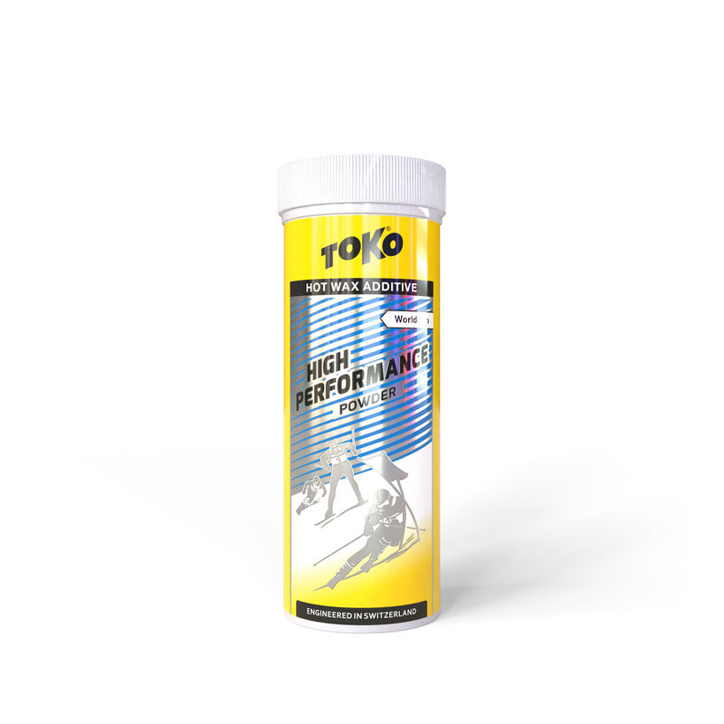 Gelbe Dose Toko High Performance Powder Blue mit Skifahrer-Motiv.