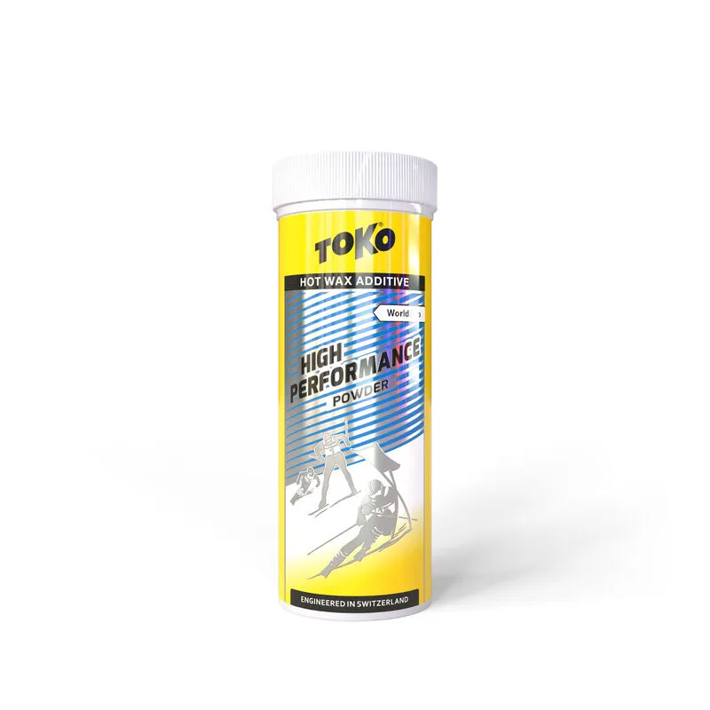 Gelbe Dose Toko High Performance Powder Blue mit Skifahrer-Motiv.