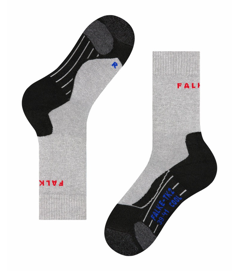 Chaussettes de trekking grises pour femmes TK2 Cool, une droite, une couchée. Zones renforcées en noir au niveau du talon et des orteils.