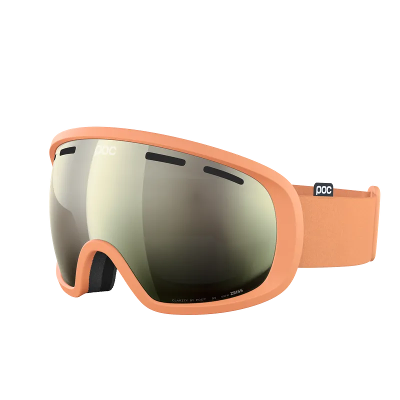 Ski goggles in peach color with a mirrored, tinted lens and a black nose guard.