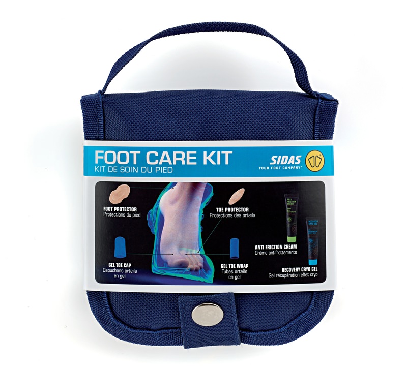 Blaues Sidas Foot Care Kit mit Tragegriff, zeigt Pflaster, Gel-Pads und Cremes für Fußpflege.
