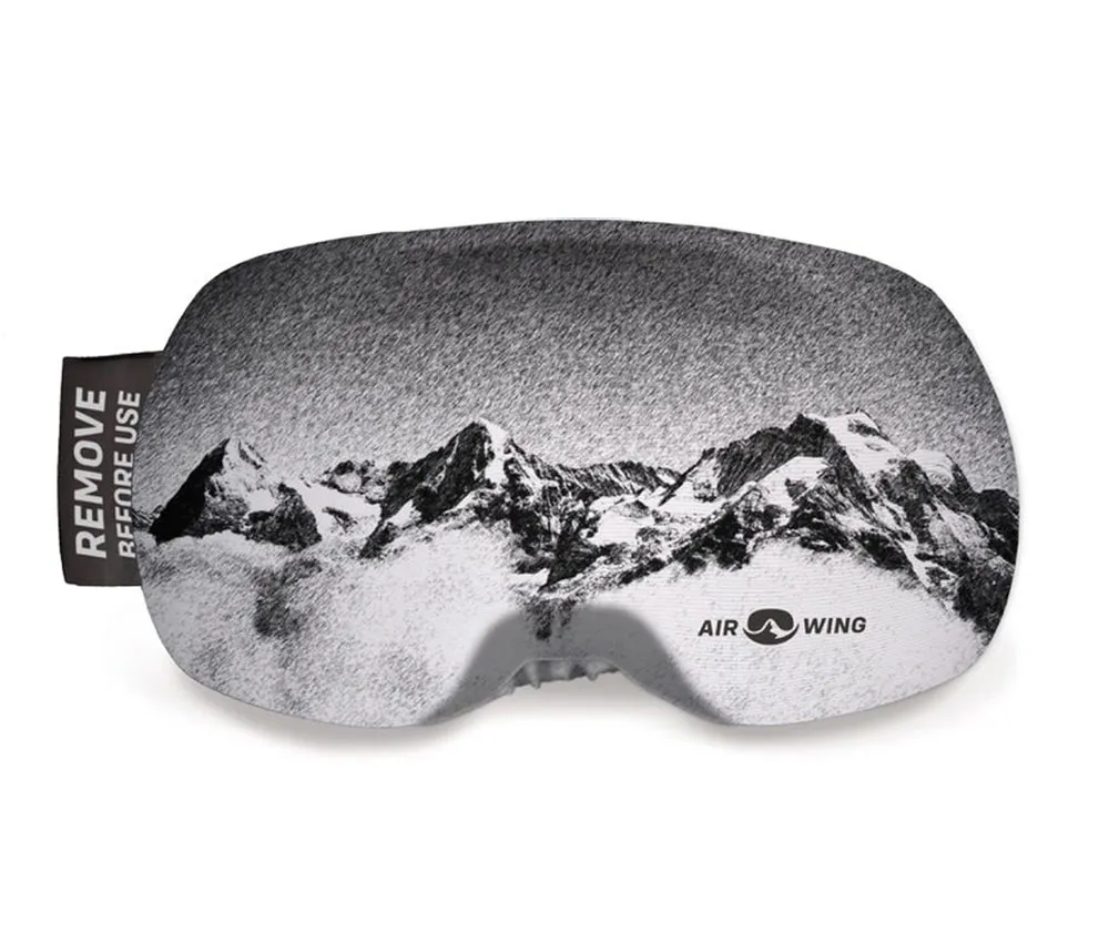 Airwing Pano ski goggle cover with mountain motif in black and white and "Remove Before Use" label.