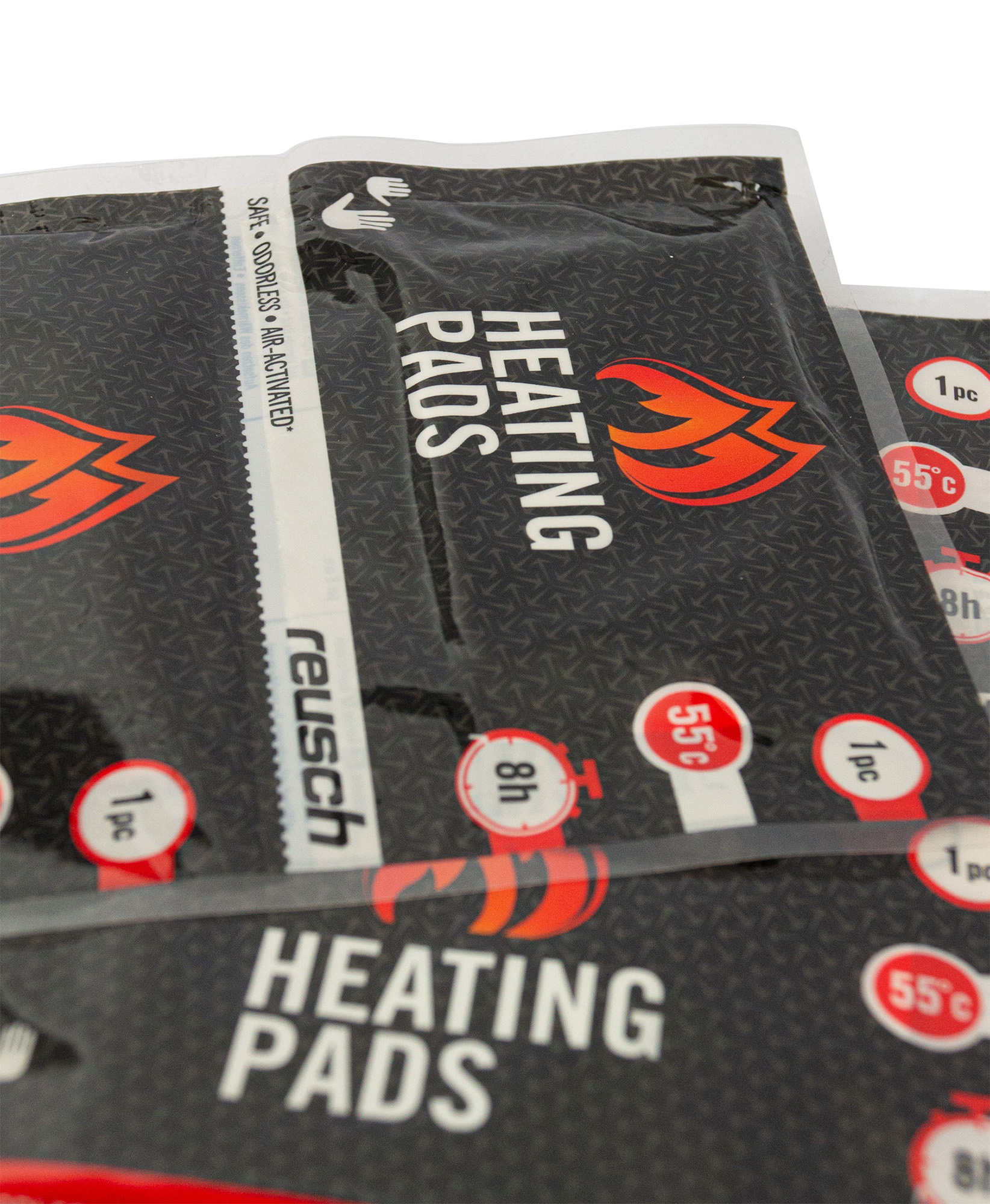 Plusieurs paquets Reusch Coussins chauffants avec logo flamme rouge, fond noir et texte blanc. Ils promettent jusqu'à 8 heures de chaleur à 55°C.