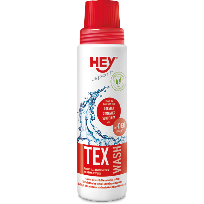 Weiße Flasche mit rotem Deckel, Aufdruck: Hey Sport Tex Wash, geeignet für Goretex, Sympatex, Schoeller Membranbekleidung.